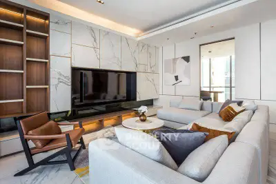 Luxurious modern living room with elegant marble accents and stylish furniture