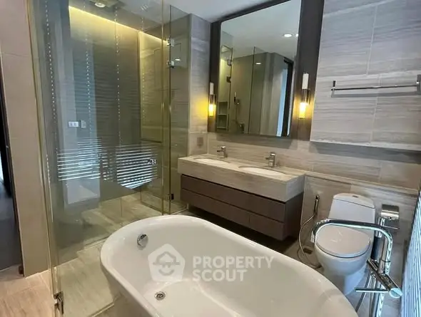 Luxurious modern bathroom with freestanding bathtub and dual sinks