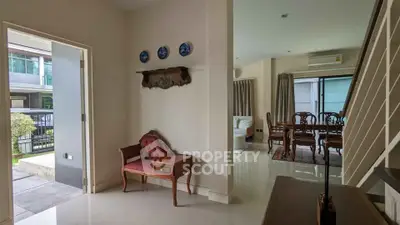 Elegant living room with classic decor and garden view