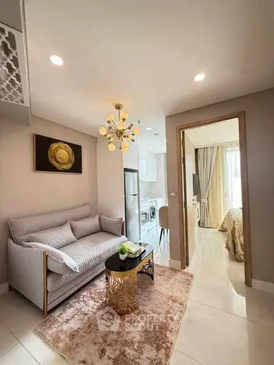 Modern living room with elegant decor and open kitchen view