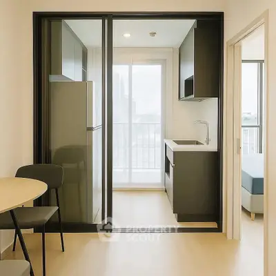 Modern compact kitchen with sleek design and balcony view