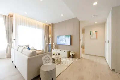 Elegant modern living room with cozy beige sofa and stylish decor