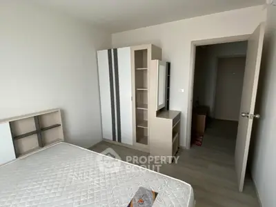 Modern bedroom with minimalist furniture and natural light