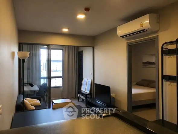 Modern apartment interior with cozy living room and bedroom view