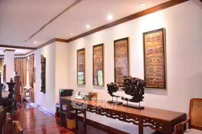 Elegant living room with traditional decor and wooden flooring