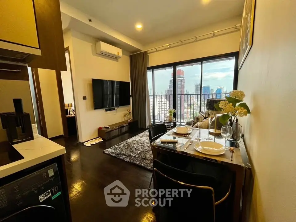 Modern living room with city view, stylish decor, and dining area in a high-rise apartment.