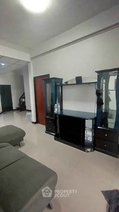 Spacious living room with modern furniture and sleek design