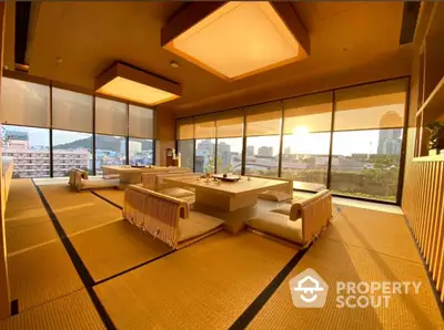 Luxurious tatami room with panoramic city view and elegant lighting