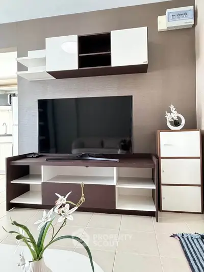 Modern living room with sleek TV unit and stylish decor