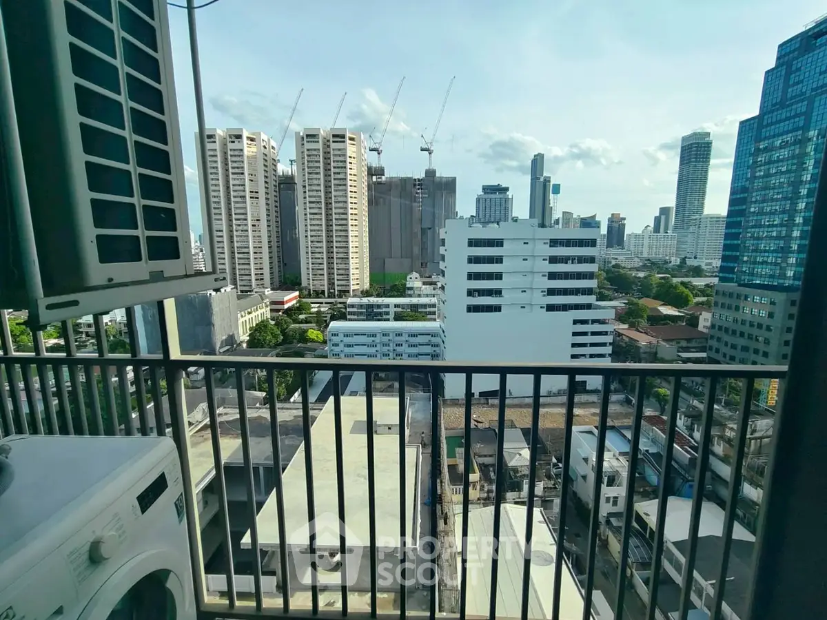 Stunning cityscape view from high-rise balcony with modern urban skyline
