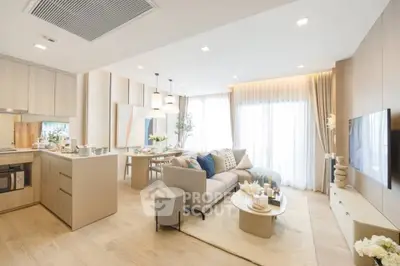 Spacious modern living room with open kitchen and elegant decor