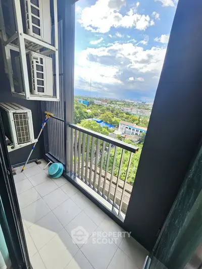 Charming balcony with stunning city view and ample natural light