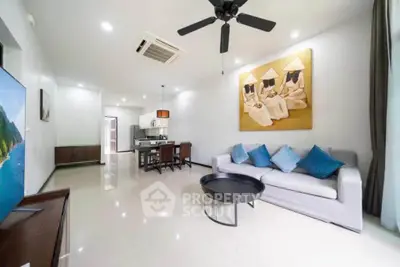 Spacious modern living room with elegant decor and open layout, perfect for relaxation and entertainment.