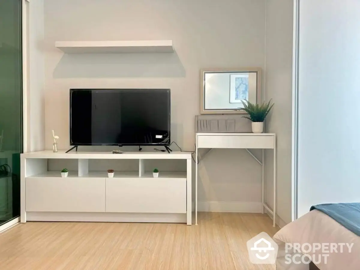 Modern living room with sleek TV stand and minimalist decor