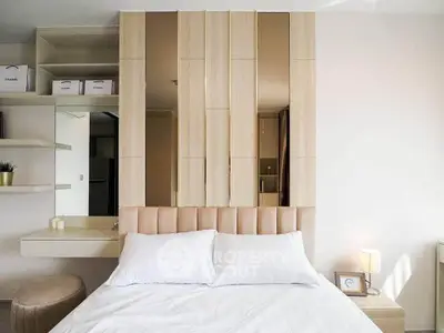 Modern bedroom with stylish decor and elegant lighting