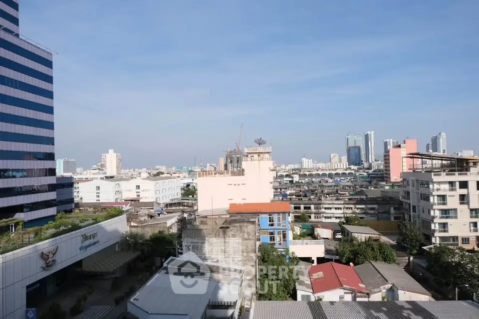 Stunning cityscape view from high-rise building showcasing urban skyline and architecture.