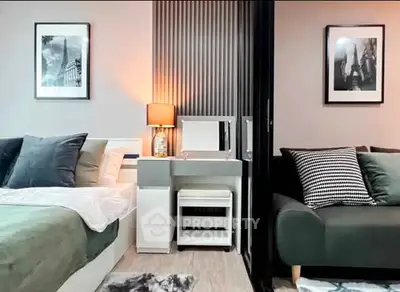 Modern bedroom with stylish decor and cozy seating area