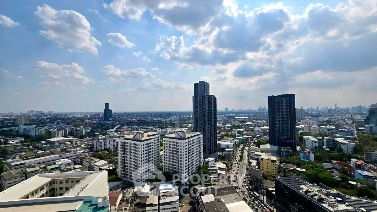 Stunning cityscape view showcasing modern high-rise buildings under a vibrant sky, perfect for urban living.