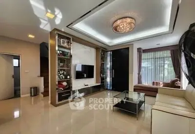 Luxurious living room with modern decor and elegant lighting