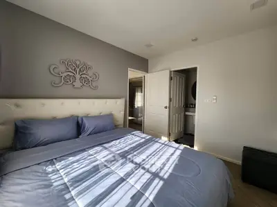 Cozy bedroom with elegant decor and soft lighting