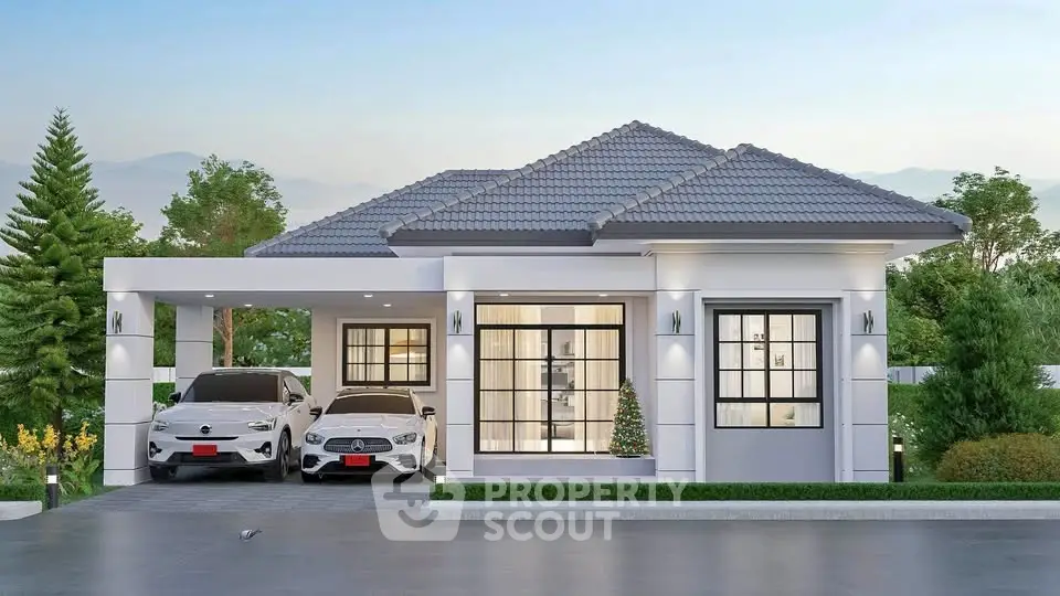 Modern single-story house with two-car garage and landscaped garden.