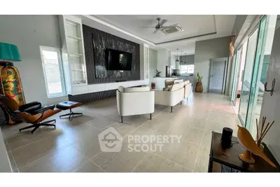 Spacious modern living room with elegant decor and open layout