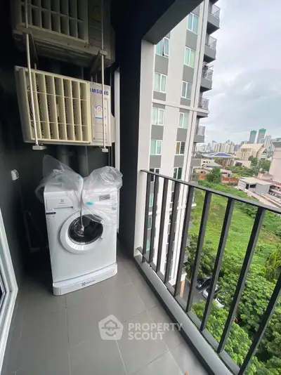 Modern apartment balcony with washing machine and city view
