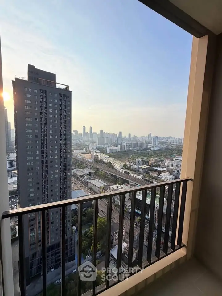 Stunning cityscape view from a high-rise balcony, perfect for urban living enthusiasts.