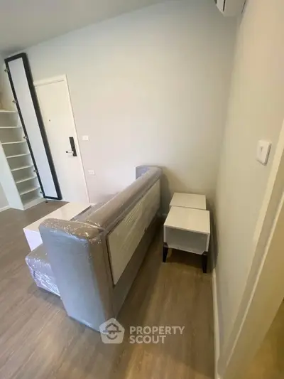 Modern apartment interior with new furniture and wooden flooring