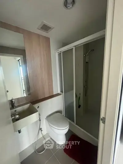 Modern bathroom with sleek shower and minimalist design