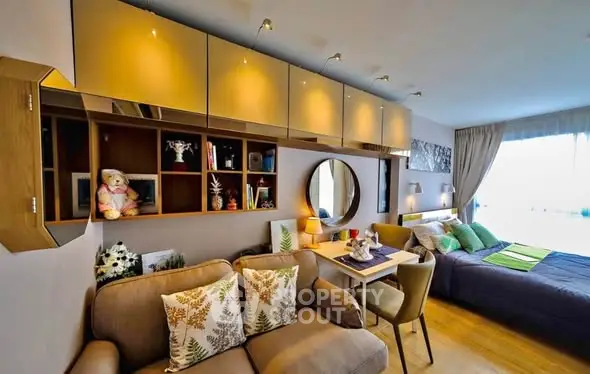 Stylish studio apartment with cozy living area and modern decor