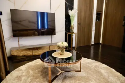 Luxurious modern living room with sleek TV setup and elegant decor