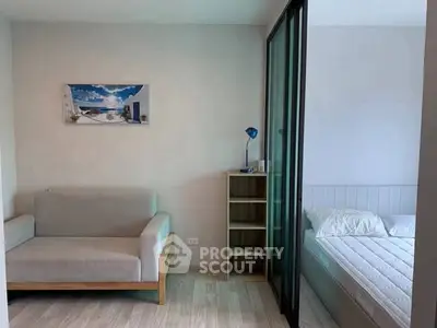 Cozy studio apartment with modern furnishings and natural light