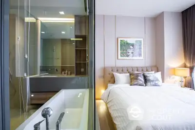 Luxurious bedroom with ensuite bathroom featuring modern design and elegant decor