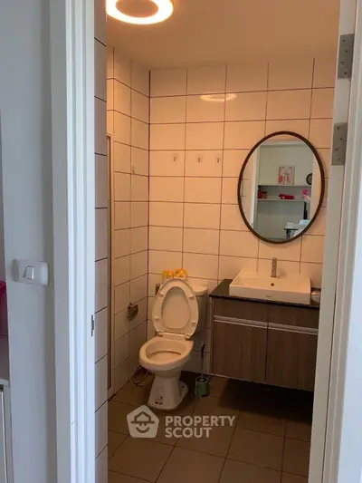 Modern bathroom with sleek fixtures and stylish tile design