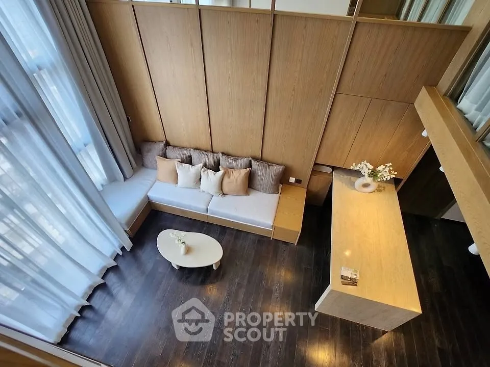 Luxurious modern living room with high ceilings and elegant decor