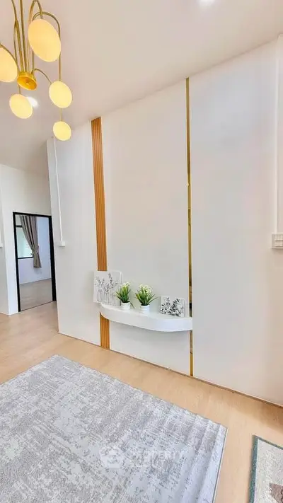 Modern living room with elegant decor and stylish lighting, featuring a cozy ambiance and contemporary design.