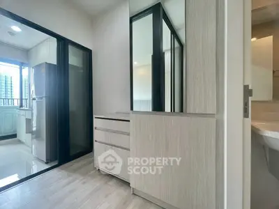 Modern apartment interior with sleek kitchen and stylish cabinetry