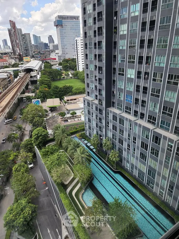 Stunning high-rise building with pool and city view in prime location