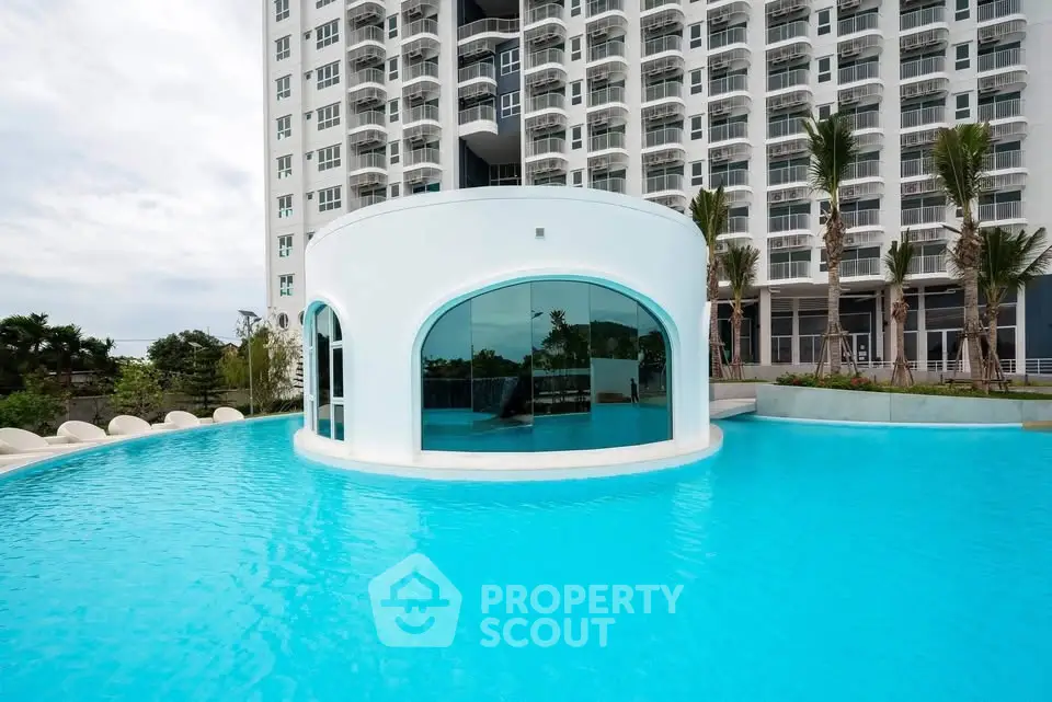 Luxurious condominium with stunning pool and modern architecture