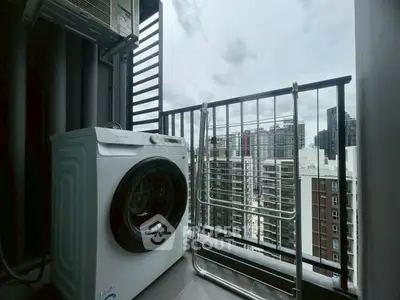 Modern balcony with washing machine and city view, ideal for urban living.