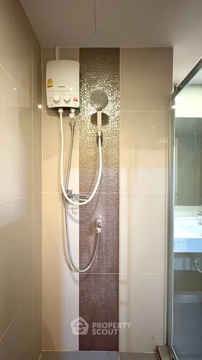 Modern bathroom with sleek shower design and contemporary tiles