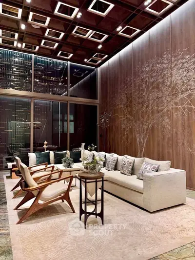 Luxurious living room with high ceiling and elegant decor