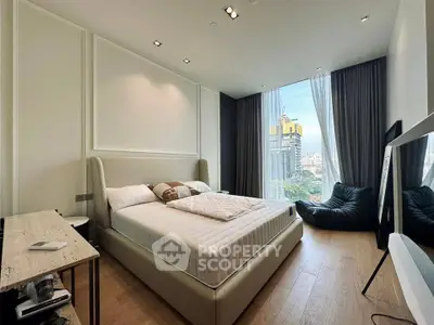 Luxurious bedroom with city view, modern decor, and floor-to-ceiling windows in high-rise apartment.