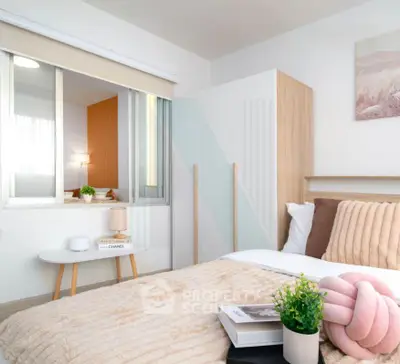 Cozy modern bedroom with stylish decor and natural light