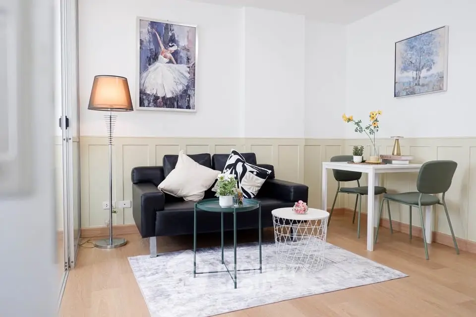 Chic modern living room with stylish decor and cozy seating area, perfect for relaxation and entertaining.