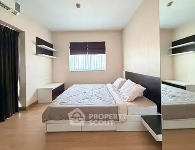 Spacious modern bedroom with elegant decor and natural light