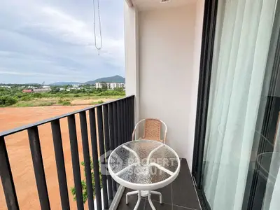 Charming balcony with scenic view, perfect for relaxation and enjoying the outdoors.
