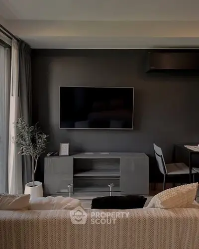 Modern living room with sleek TV setup and stylish decor