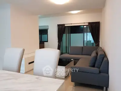 Spacious modern living room with sleek furniture and elegant decor